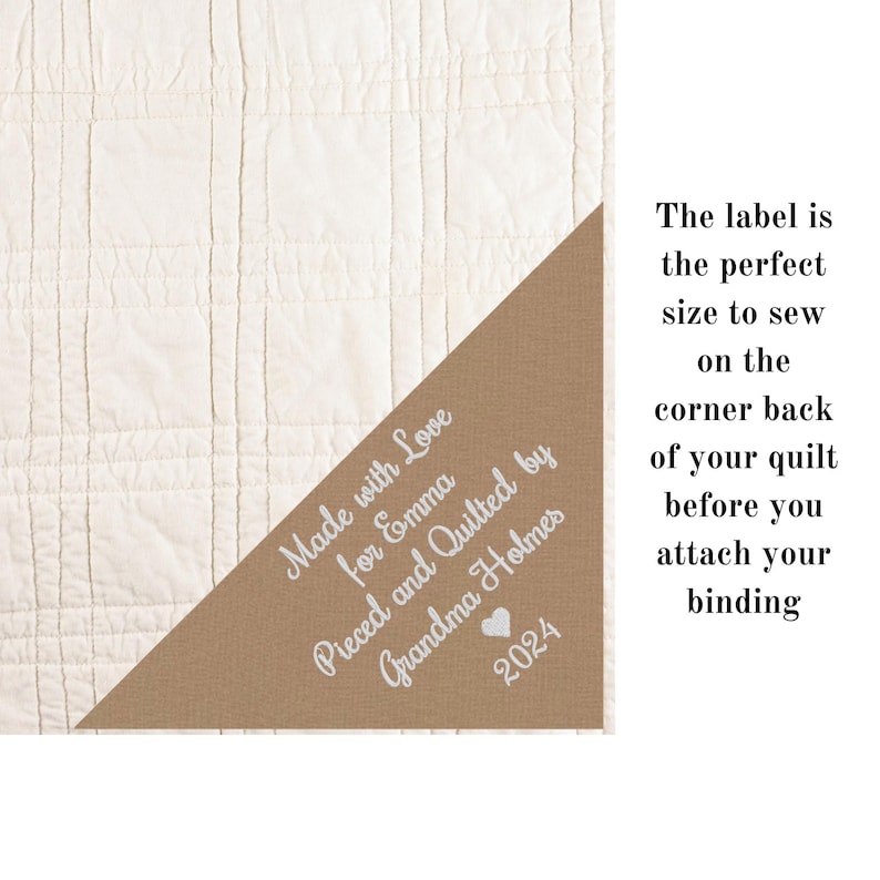 May include: A brown fabric label with white text that reads "Made with Love for Emma Pieced and Quilted by Grandma Holmes 2024". The label has a small heart symbol next to the year.