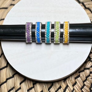 Handwoven beaded band rings