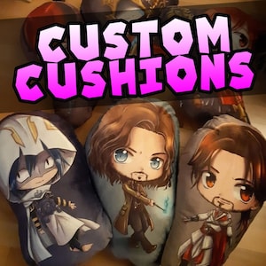 May include: Custom-made cushions featuring cartoon characters. The cushions are made of soft fabric and have a variety of designs. The text "CUSTOM CUSHIONS" is displayed in pink letters across the top of the image.