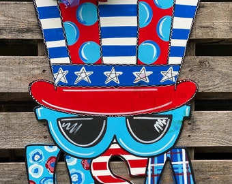 May include: A wooden door hanger decorated with a red, white, and blue Uncle Sam hat, sunglasses, and the word "USA" in large letters. The hat is decorated with white stars and blue and red stripes. The sunglasses are blue with black lenses. The letters are decorated with red, white, and blue stripes, polka dots, and floral patterns.