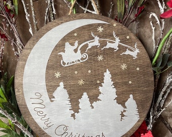 Merry Christmas Santa’s Sleigh at Nightime Wall Decor Holiday Round Wood Sign with Braided Twine Hanger
