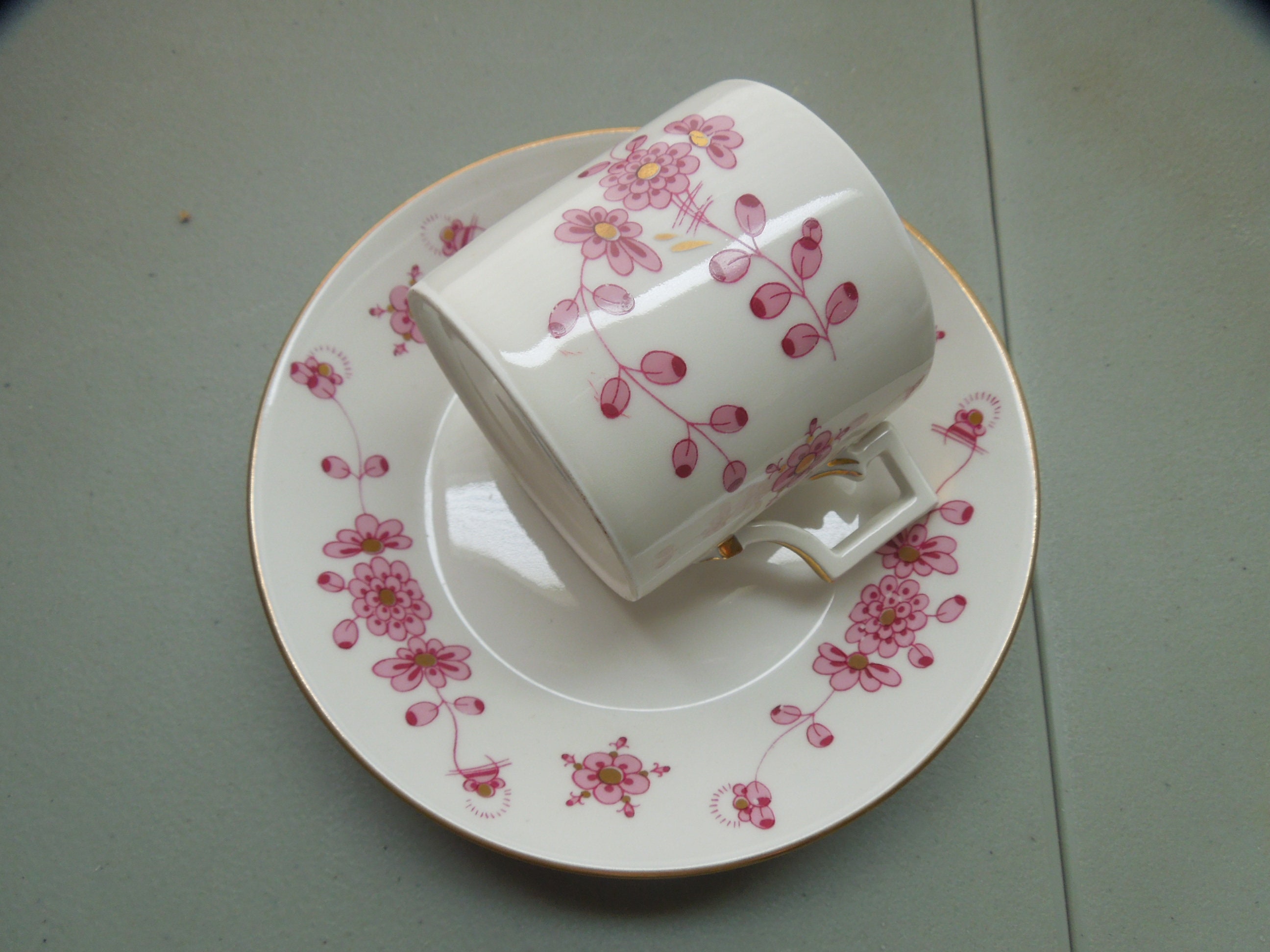 Antique KPM Berlin Demitasse Cup and Saucer: Pink Floral, Gold  display picture 1
