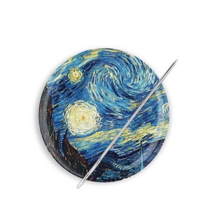 May include: A round pinback button featuring a reproduction of Vincent van Gogh's "Starry Night" painting. The button is blue, yellow, and white with swirling brushstrokes.