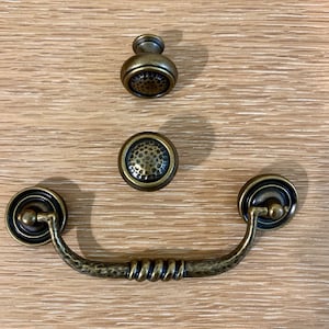 Set of (10) Hammered Brass Bail Pulls with Rosettes
