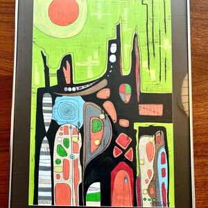 May include: A framed artwork featuring a vibrant lime green background with a large orange circle. The composition includes black abstract shapes, intricate patterns, and various colored forms in red, blue, and white. The text HORMUZ and SPERGIN are visible.