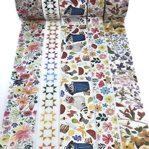 May include: Decorative washi tape rolls with various designs. Patterns include floral arrangements, geometric shapes, and a raccoon rummaging through a trash can. The tape is white with colorful illustrations, perfect for crafts and scrapbooking.