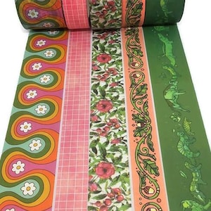 May include: A collection of decorative washi tape rolls featuring various designs. Patterns include a retro floral design, pink grid, floral and berry print, an orange and green leaf design, and a green design with figures.