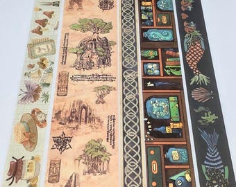 May include: Several rolls of decorative washi tape with various designs. The tapes feature illustrations of trees, buildings, and other elements in a vintage style. One tape has a shelf design with bottles and other objects.