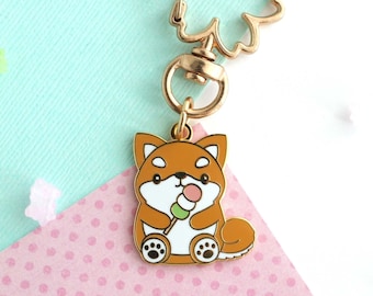 Shiba Inu holding a Dango Enamel Keychain. Dog Eating Japanese Snack Keychain Charm. Colourful Dog Keyring