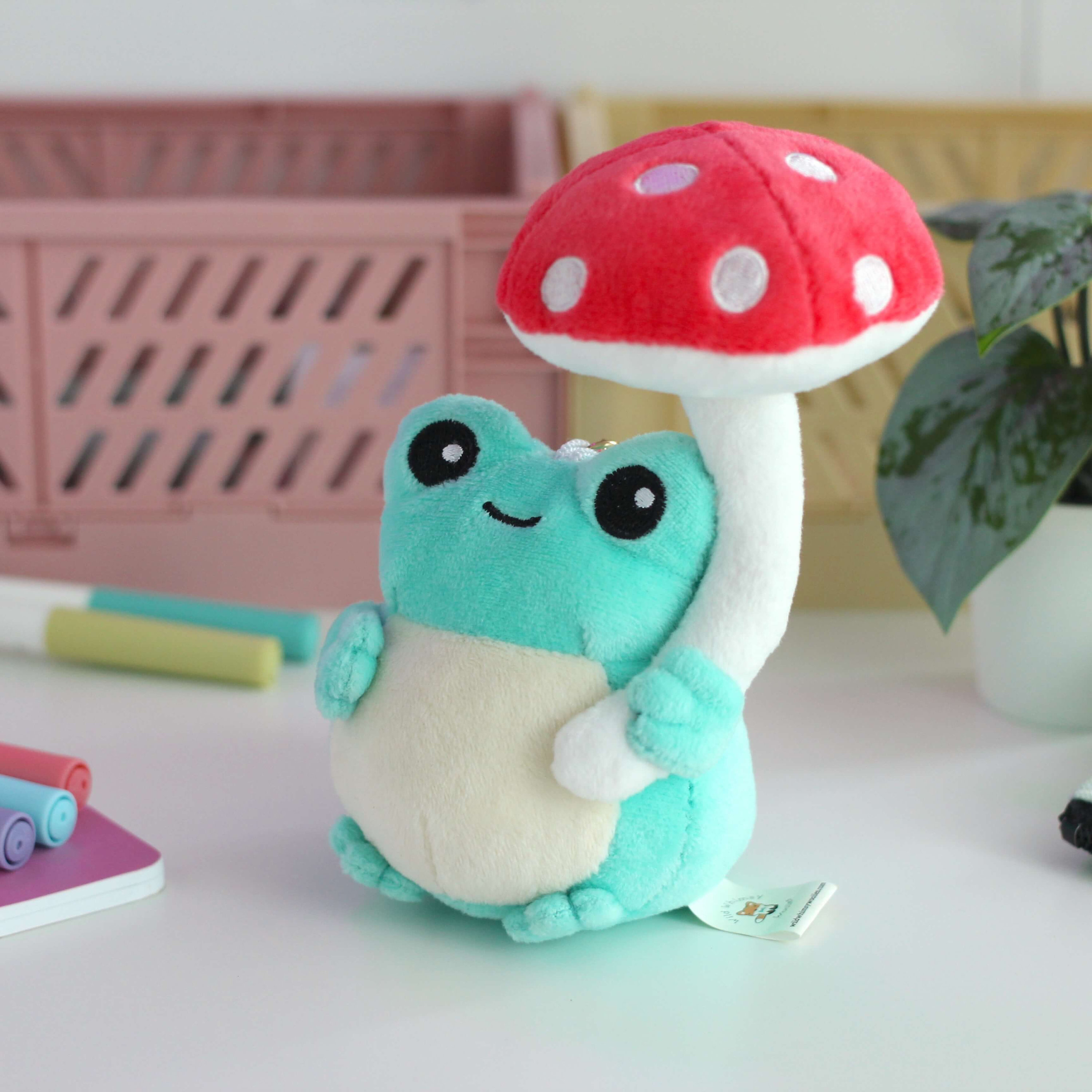 WildWhimsyWoolies Mushroom Frog Plush Keychain. Cute Plushie Charm for Purse, Tote Bag or Backpack. Kawaii Stuffed Frog Holding Red Mushroom Umbrella