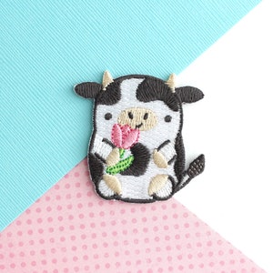 Flower Cow Embroidered Iron On Patch. Cute Black and White Cow holding a Pink Tulip. Cow Patch for Jeans, Jackets and backpacks