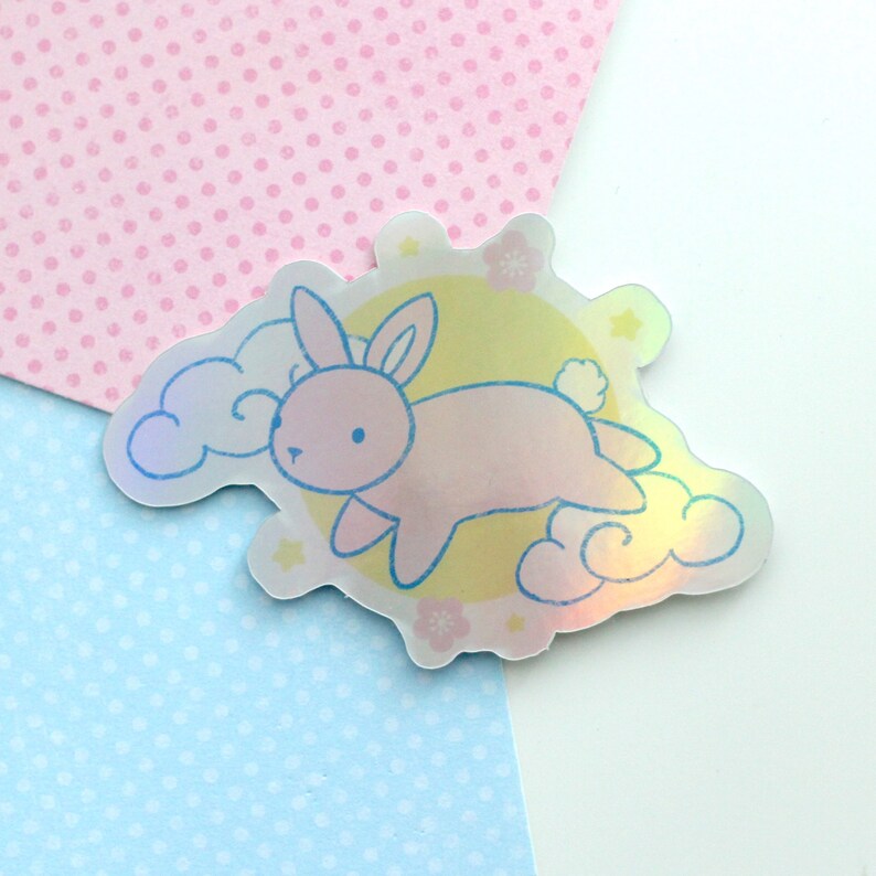 Holographic sticker of a bunny with moon and clouds