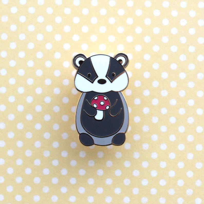 Badger holding Red Mushroom Enamel Pin. Badger Gift. Cute Woodland Animal Pin. Jacket and Backpack Pin for Animal Lovers. Mushroom Accessory Red Mushroom