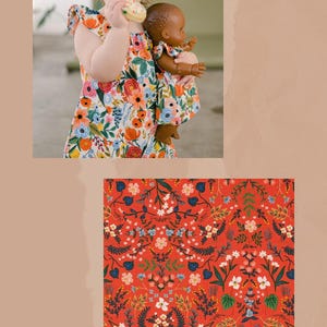 May include: A sleeveless dress featuring a vibrant floral pattern with red, orange, blue, and white flowers on a light background. A matching doll dress is included. The fabric design is labeled as Wildwood Red Metallic, showing a dense botanical print.