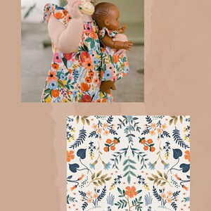 May include: A sleeveless dress featuring a vibrant floral pattern with orange, blue, and green botanical elements on a white background. The fabric design is labeled as Wildwood White Metallic. A matching doll dress is also shown in the image.