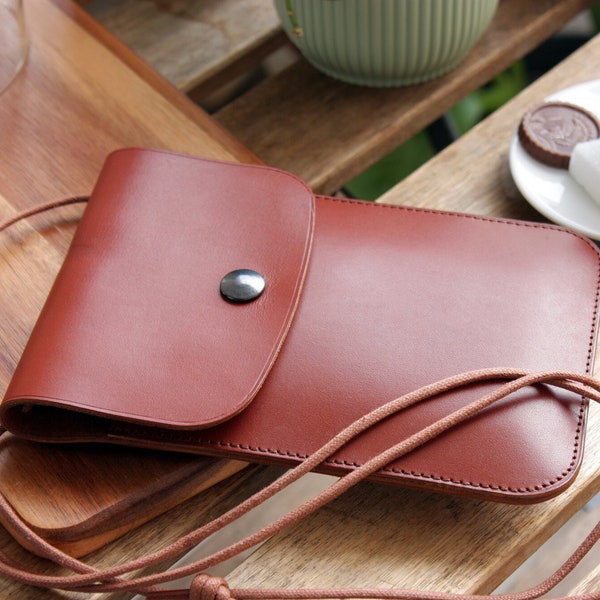 Leather smartphone bag in Cognac Brown color with flap closure for all smartphones