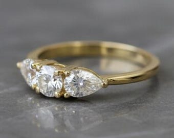 Gold Triple Stone Moissanite Ring: Pear Shape Art Deco Engagement