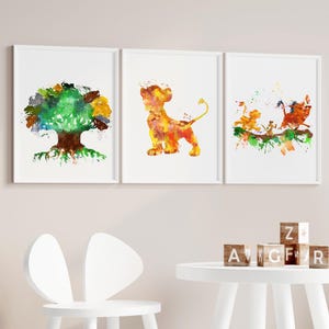 May include: Set of three framed watercolor prints featuring characters and scenes from a popular animated film. The prints showcase a tree, a lion cub, and a group of characters on a branch, all in vibrant colors.