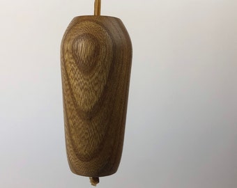 Hand turned Elm bathroom light pull handle made in cornwall by Zennor Made tactile ergonomic cone egg pear rounded smooth wood wooden
