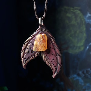 Fire Witch Amulet ''Loart'' with Amber and Painting of the Norse Elder Futhark Kaunaz Kauna