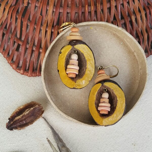 Women's hickory nut shell earrings in dark yellow. Natural, organic jewelry gifts for her