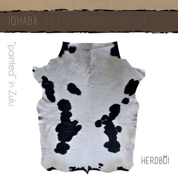 Cowhide Rug - Extra-large, black and white, Nguni cow hide - African cow skin rug with large bold spots that would look great in any room