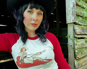 Rope you in! Unisex Raglan Graphic T-shirt in Natural x Red Vintage inspired by Mischief Made Western