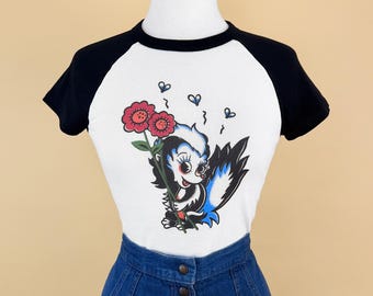 Little Danger Short Raglan Cropped Baby Graphic T-shirt in White/Black Vintage inspired by Mischief Made, Skunk