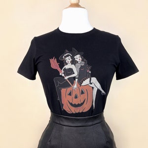 Witch Sisters Fitted Graphic T-shirt in Black size S,M,L,XL,2XL,3XL  vintage Halloween inspired by Mischief Made pinup