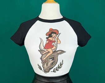 Taurus Bull Cropped Raglan Baby Tee in White/Black size S, M, L,XL, 2XL vintage inspired by Mischief Made Zodiac