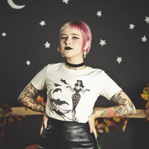 Deadly Dame Fitted Graphic T-shirt in Ivory size S,M,L,XL,2XL,3XL  vintage Halloween inspired by Mischief Made Bat Pinup