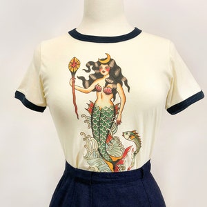 Queen of The Seven Seas Fitted Ringer Graphic T-shirt in Natural/Navy size S, M, L,XL,2XLVintage inspired by Mischief Made Mermaid