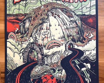 May include: A concert poster for Billy Strings featuring a large central rock formation, a winding road with a car, and stone arches. The text reads BILLY STRINGS, FEBRUARY 7, 2025, ASHEVILLE, NC, EXPLOREASHEVILLE.COM ARENA, with a dark blue, red, and green color palette.