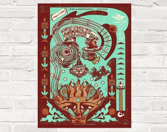 May include: A rectangular concert poster featuring a dark red background with a light teal central design. It displays the text Tedeschi Trucks Band, August 7, 2026, McMenamins Edgefield Amphitheater, and Portland Oregon. The art includes a sun face, cat, and pinball-style graphics.