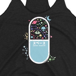 May include: Black racerback tank top with a light blue capsule graphic. The capsule design features a colorful space scene with planets, stars, and an alien. The text "space capsule" is printed on the capsule in both Japanese and English.