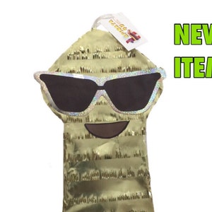 May include: Gold pinata shaped like a face with sunglasses and a smile. The pinata has a tag that says "Get It Started".