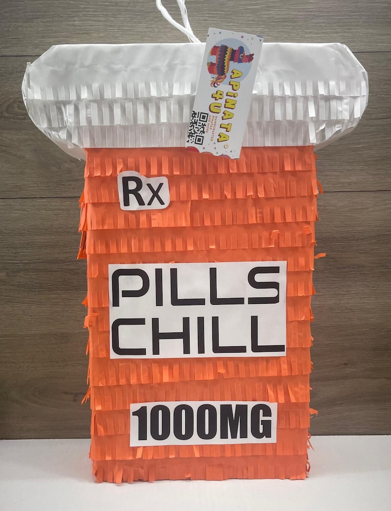 May include: Orange and white pinata shaped like a pill bottle with the text "Rx Pills Chill 1000mg" on the front.