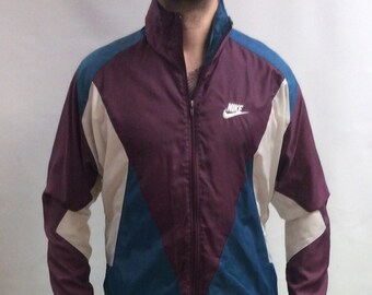 purple and teal nike windbreaker