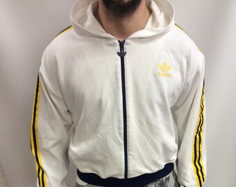 yellow adidas jacket with black stripes