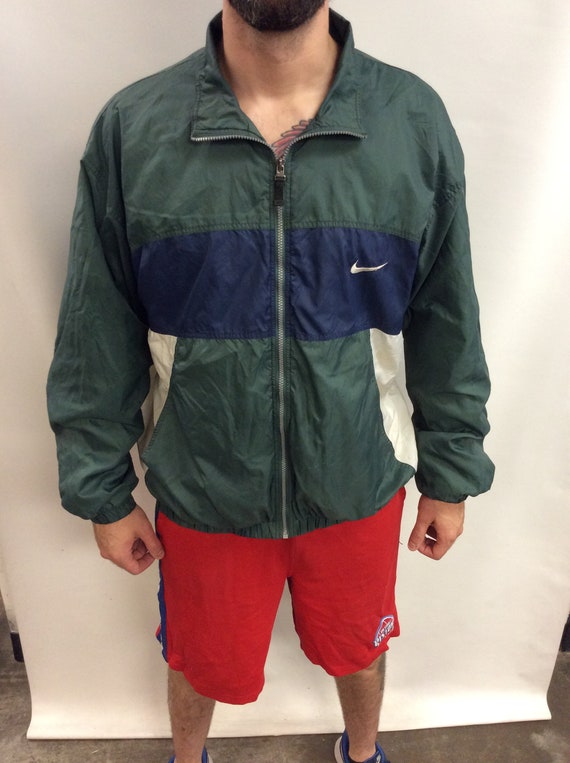 green and blue nike windbreaker