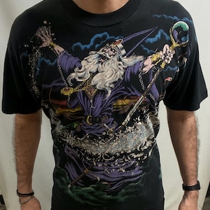 Vintage jaren 90 Wizard graphic T-shirt: vloeibaar blauw all-over print, XL