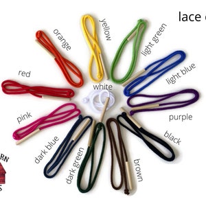 May include: A variety of colors of lace, including red, orange, yellow, white, light green, light blue, purple, black, brown, dark blue, and dark green. The lace is arranged in a circle with the colors labeled. The text "lace colors" is written at the top of the image. The text "RED BARN TOYS" is written at the bottom of the image.
