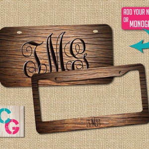 May include: A wooden license plate frame with a monogrammed design. The frame is brown with a wood grain texture. The monogram is in black and reads "JMC". The frame is shown with a blank license plate. The text "ADD YOUR NAME OR MONOGRAM" is shown in a pink box with a white outline.