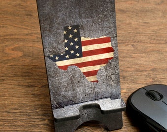 State of Texas with American Flag Cell Phone Stand on Gray Background
