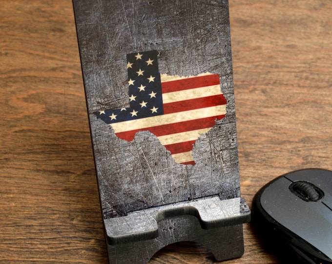 State of Texas with American Flag Cell Phone Stand on Gray Background