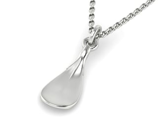 May include: A silver necklace with a small, smooth, teardrop-shaped pendant.