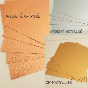 May include: A close-up of three stacks of paper. The top stack is a rose gold glitter paper with the text "paillet&eacute; or ros&eacute;". The middle stack is a silver metallic paper with the text "argent metallise". The bottom stack is a gold metallic paper with the text "or metallise".