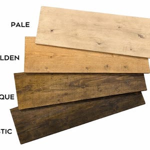 K&ouml;nnte beinhalten: Holzbretter in verschiedenen Braunt&ouml;nen, von hell bis rustikal. Die Bretter sind diagonal angeordnet und zeigen die verschiedenen Holzt&ouml;ne. Der Text kennzeichnet jede Farbe: Pale, Golden, Antique und Rustic.