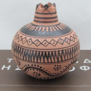 reproduction of  neolithic terracotta pottery - pomegranate - ancient Greece - primitive reproduction - neolithic age greece