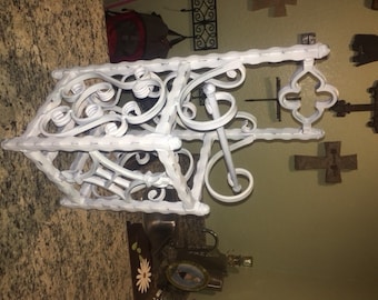 Wrought iron toilet paper holder